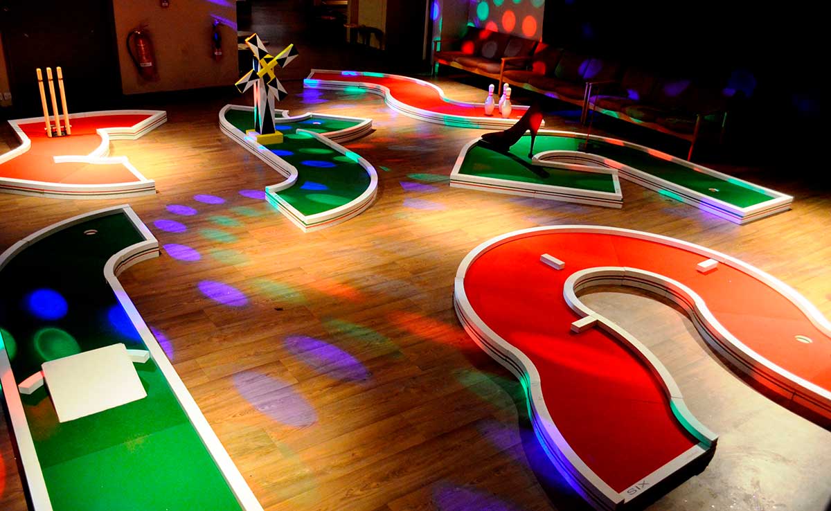 Putt putt rentals green and red holes image